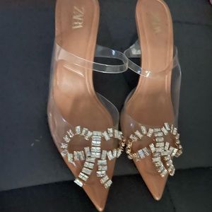 Shimmery vinyl mules with bow